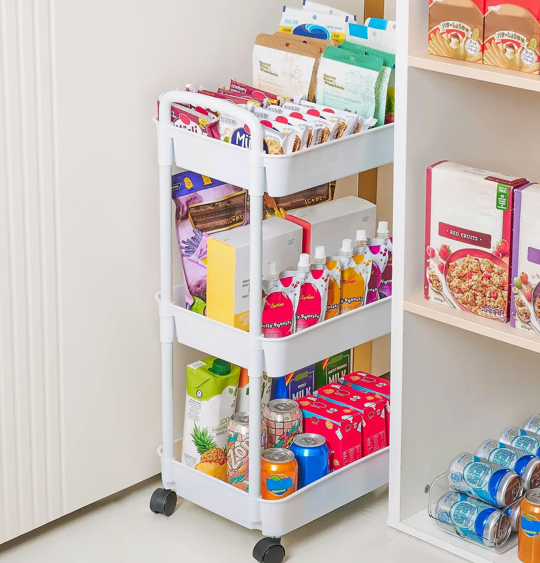 Rolling utility cart with lockable wheels and storage baskets